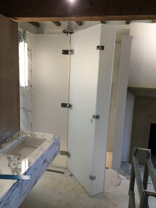 Bespoke frosted glass shower enclosure in Norbury luxury bathroom