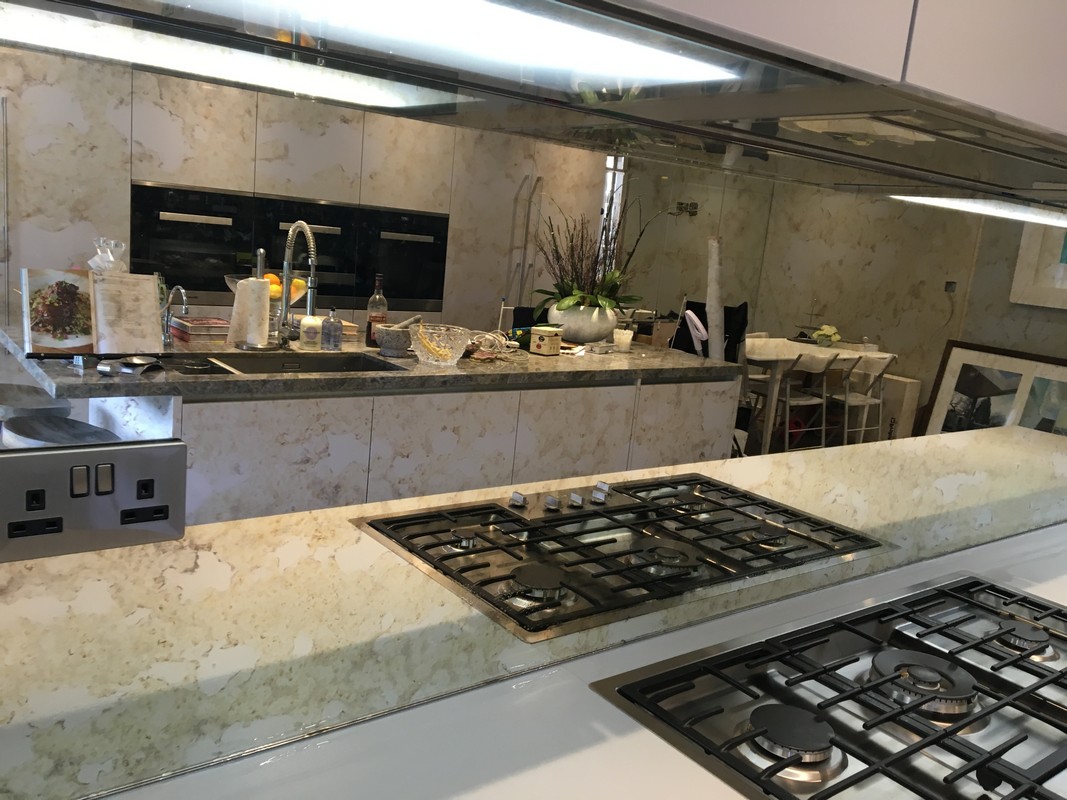 Mirror glass splashback in Norbury luxury kitchen